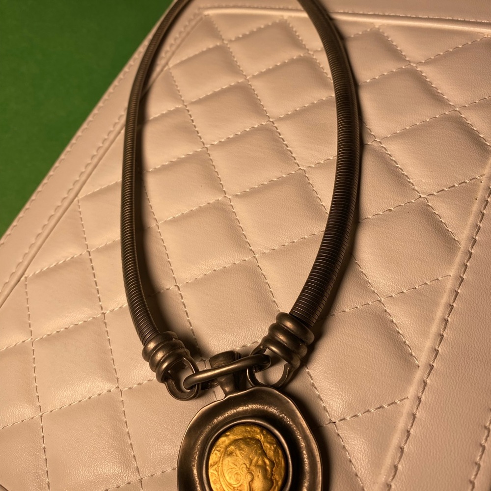 Elegant Gold and Silver Pendant Necklace